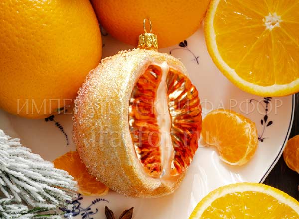 Christmas tree toy Berries and fruits. Grapefruit with dew