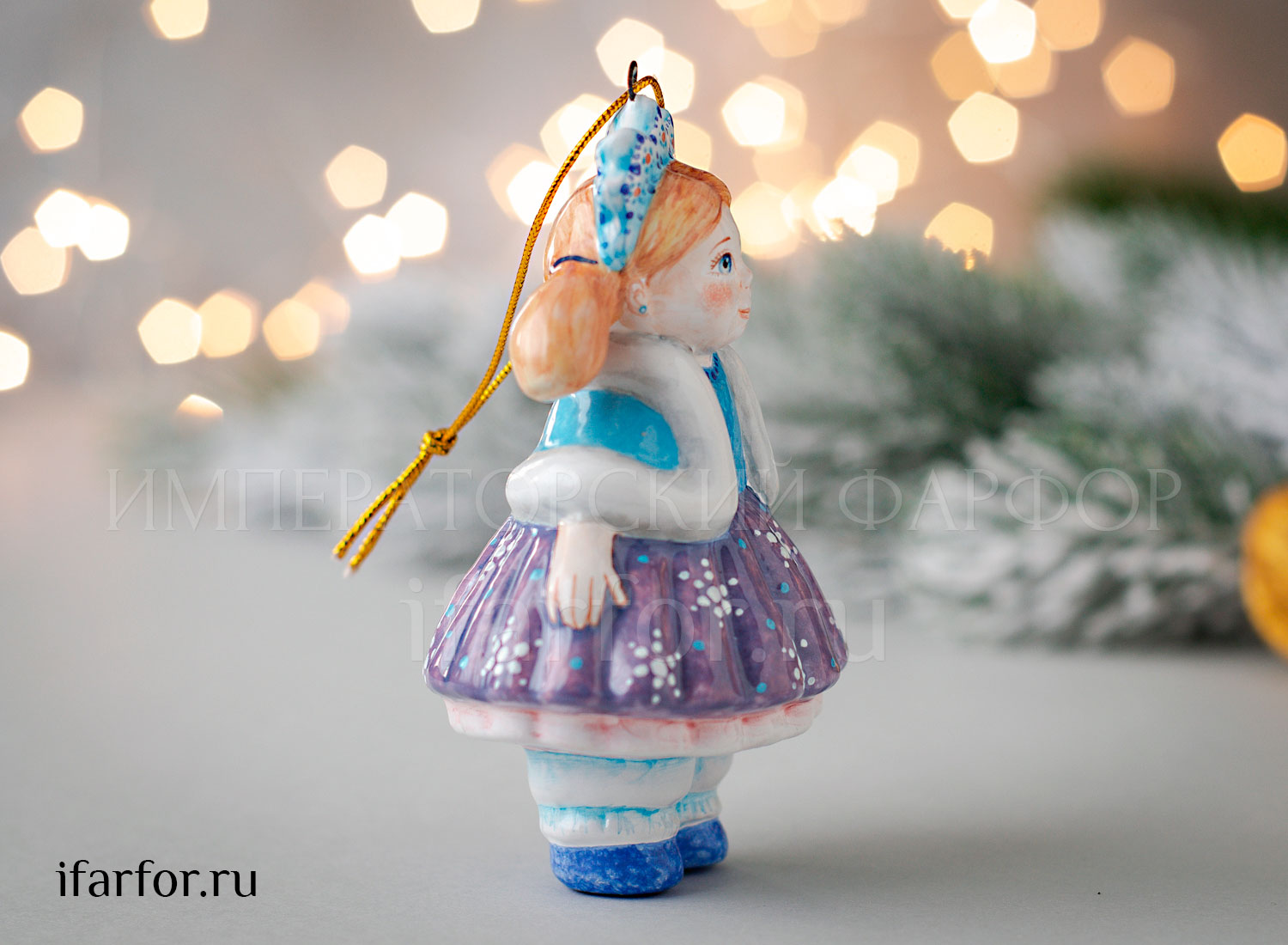 Елочная игрушка «Малышка Снежинка» Форма: Малышка Снежинка. Майолика. 95 мм.