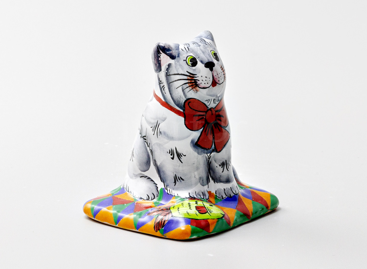 Скульптура «Кот на ковре» Форма: Кот на ковре. Майолика. 75 x 70 x 80 мм.