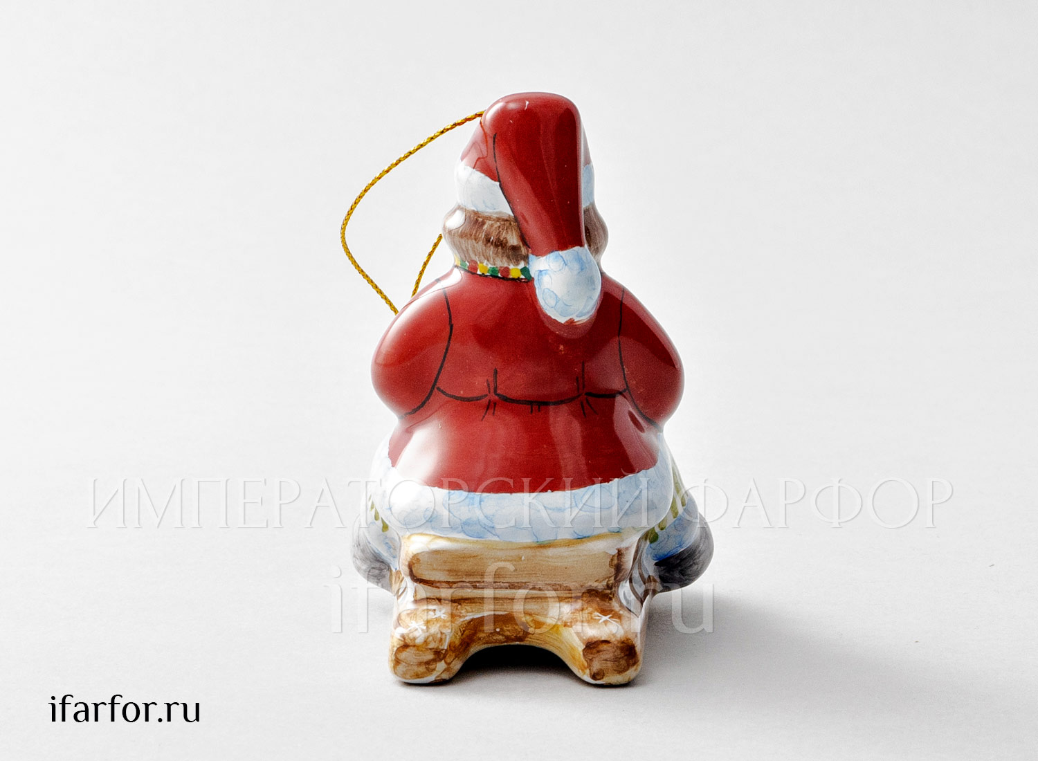 Елочная игрушка «Мальчик на санках с собачкой» Форма: Мальчик на санках с собачкой. Майолика. 60 x 85 x 93 мм.