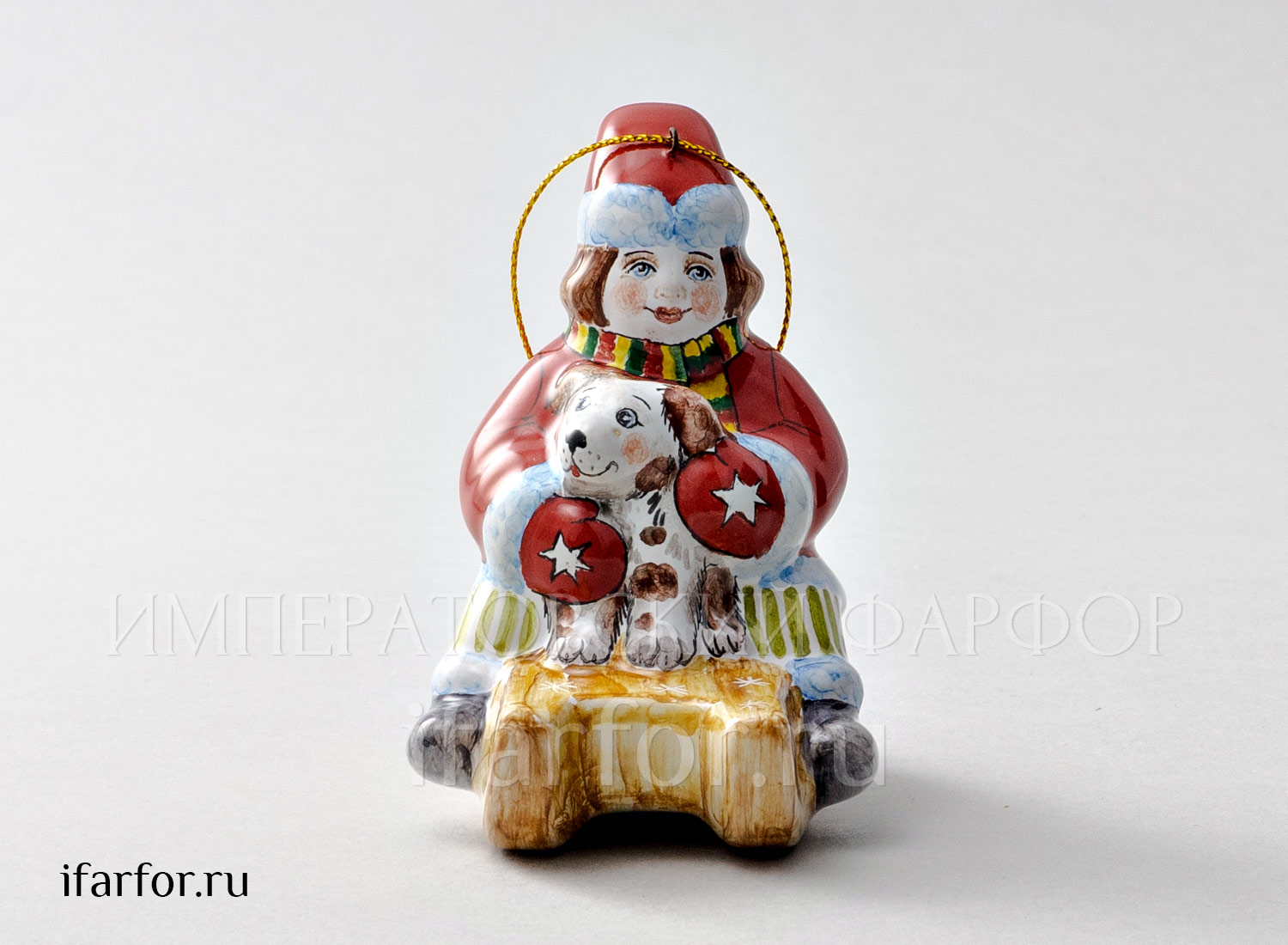 Елочная игрушка «Мальчик на санках с собачкой» Форма: Мальчик на санках с собачкой. Майолика. 60 x 85 x 93 мм.